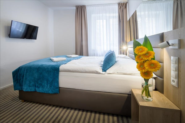 Modern family room with 2 bedrooms in hotel White Lion for four persons<br /><br  Modern family room with 2 bedrooms Room in boutique hotel vacation rental 28167036