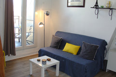 Weather permitting you can enjoy breakfast on balcony with the classical view of Paris, France Great short stay in Paris Entire rental unit vacation rental 5523769