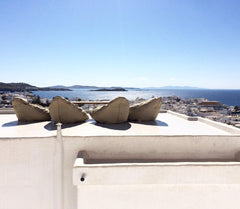 Suite IN Mykonos town with a sea view rooftop terrace and big table with puffs.  Athens, Greece CLOE [Mykonos High] Seaview Suite- IN town Cycladic home vacation rental 13739799