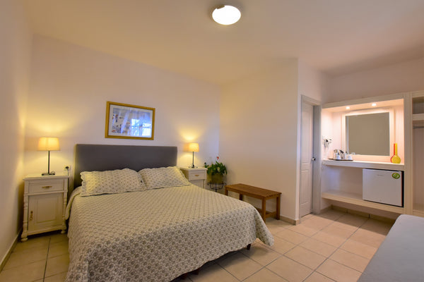 Rodakas Hotel, has 23 rooms with a total capacity of 64 people. <br />We served  Thera, Greece Family room, amazing pool, breakfast included Room in hotel vacation rental 3081671
