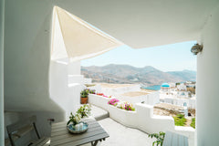 A studio for 2 people + a child in a mezzanne  with its own kitchen fully equipp Greece PLORI STUDIOS/VLYHADA restored cycladic studio Private room in home vacation rental 18862554