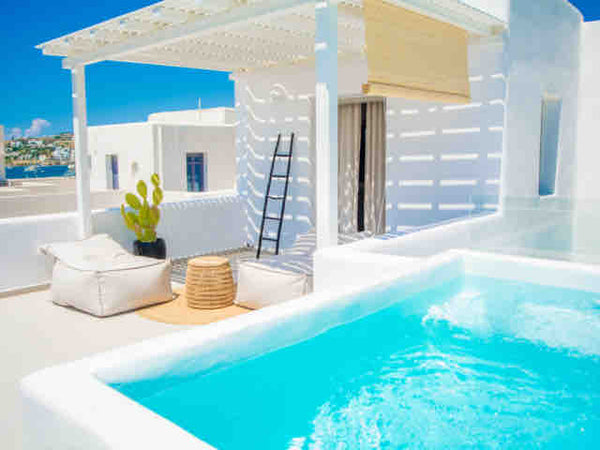 Escape to unforgettable boutique experience in the heart of Paros. White Blossom Paros, Greece White Blossom Hotel - Suite with Hot Tub Entire serviced apartment vacation rental 43139304