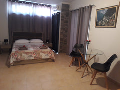 The apartment is only 1,2 Km from the city center at the area of Nea Chora 50 me Greece Luminous underground HEAVEN by the sea. Entire rental unit vacation rental 32809562
