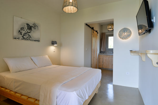 Facing the beachfront in Ándros, Rooster Miniature Apts features a garden.<br /> Athens, Greece Rooster Guesthouse Rooms - Standard Apartment Entire rental unit vacation rental 30780793