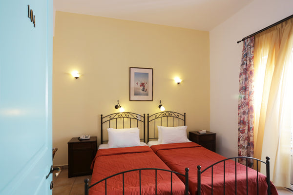 Twin Room is a colorful place to be in Brazzera Hotel, a beachfront property ide Heraklion, Greece Twin Room with Garden View in Brazzera Hotel Private room in bed and breakfast vacation rental 53949080