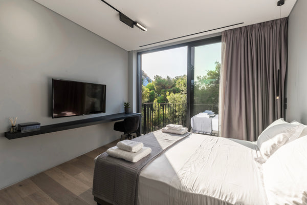 With soft neutral palettes, a comfortable living room, a cozy bedroom and a spac CY The Duke suite 401 (studio suite) Room in aparthotel vacation rental 38174612