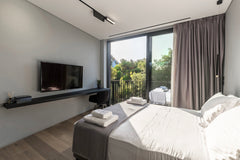 With soft neutral palettes, a comfortable living room, a cozy bedroom and a spac CY The Duke suite 401 (studio suite) Room in aparthotel vacation rental 38174612