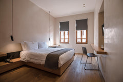 Revitalize your senses with an excellent night’s sleep on your queen size bed in  Design Suite Room in hotel vacation rental 53037937
