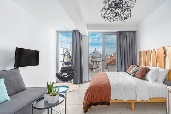 This loft is tastefully furnished with modern day comfort & style in mind. This  GR Hermes (Apt. with Balcony) Mythos Luxury Suites Entire condo vacation rental 563541349714103055