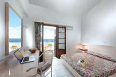 Amphitheatrically built over the paradise beach of Agios Petros, Niriides Hotel   Niriides - Apartment with 2 Bedrooms & Sea view Entire serviced apartment vacation rental 25365488
