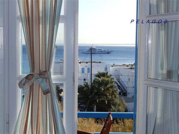 Conveniently located just 50 m from Platis Yialos Beach, Pelagos Studios enjoy a Platis Gialos, Greece Pelagos Studios 4 Adults Sea View Room in hotel vacation rental 32523614