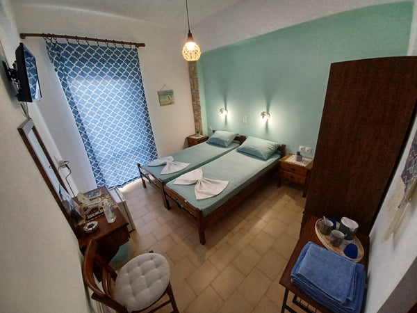 The room is very close to the port of the village and the sea. The access to bot Heraklion, Greece Lefteri's Rooms III Private room in condo vacation rental 24119128