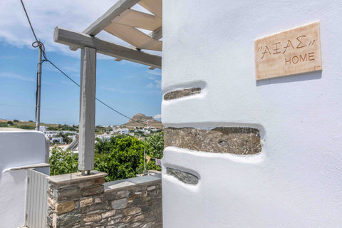 A neoclassical house of 90sqm. with touches of colors and objects that make it f Greece AXAS HOUSE Cycladic home vacation rental 37964148