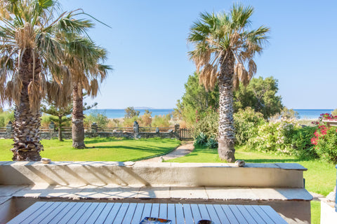 Beach house located directly on Agia kyriaki beach. Panoramic views from your ba  So close to sea... Cycladic home vacation rental 31377590