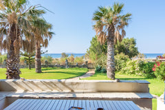 Beach house located directly on Agia kyriaki beach. Panoramic views from your ba  So close to sea... Cycladic home vacation rental 31377590