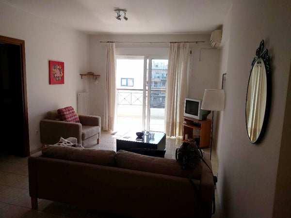 Spacious, quiet & sunny appartment (53 square metres) located next to Larissa Me Paiania, Greece Cosy Apt by the Metro & Central Trains Entire rental unit vacation rental 23315248