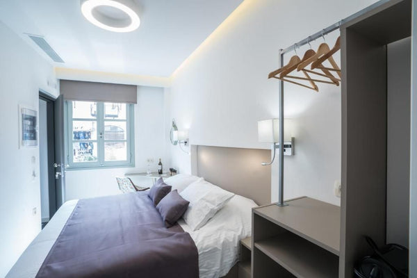 Our cozy double room is a nice option for couples. The location is excellent to   Portou 01. Ground Floor Budget Room Room in aparthotel vacation rental 32150060