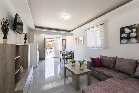 At the center of the famous resort , Panormos, and only 200 metres from the loca  Cozy apartment for 3 persons in Panormo, sea view Entire rental unit vacation rental 35860542