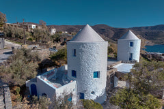 These two ancient stone windmills from the 1900s have been fully restored in 202 Athens, Greece Zen Blue Mills in Kea - Red Suite Private room in guesthouse vacation rental 585451422585226915