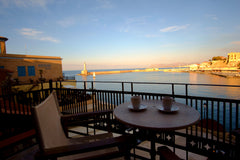 The suite is located on the 2nd floor of a 600 years old Venetian waterfront bui Greece E1.Balcony old harbor view Luxury suite Entire townhouse vacation rental 12974162