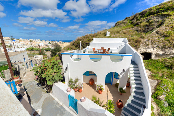 A beautiful Cave House carved inside the volcanic earth, in Vothonas, a traditio Athens, Greece Santorini Traditional Cave House Cycladic home vacation rental 12034815