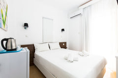 Kissamia Rooms are located only 20 metres from Kissamos 'Telonio' beach.<br />Sm Kissamos, Greece SGL/Double 11m2+Bathroom+Comfy Bed+Near Nightlife Room in hostel vacation rental 15323504