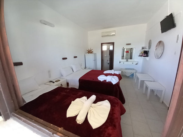 From the moment you reach at our hotel our primary target is to transform your s  Psiloritis, triple near the beach Private room in rental unit vacation rental 625858090933117265