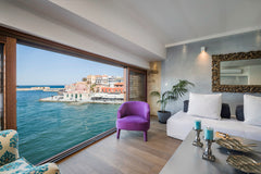 Overlooking the Old Venetian Harbor and the emblematic lighthouse, Residenza Vra Chania, Greece Two Bedroom Sea View Suite (Interior Balcony) Entire rental unit vacation rental 18247154