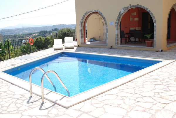 Ground floor apartment with shared swimming pool, close to a large sandy beach a  Sea view apartment Ariadne 1 Entire rental unit vacation rental 31612316