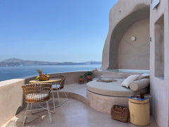 Discover a modern cave house with a jetted tub on a privileged, secluded spot wh Oia, Greece The Exotic Cave Suite Room in aparthotel vacation rental 640432763738681823