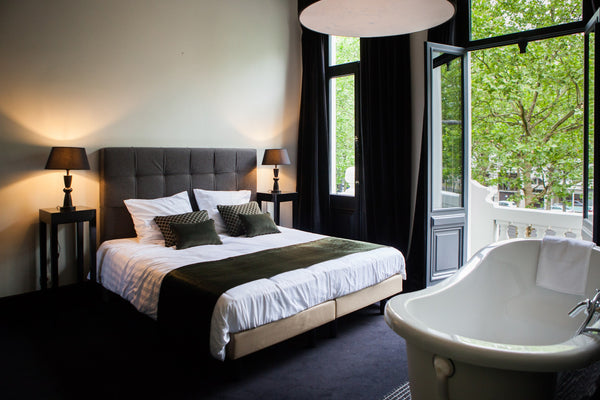 Enjoy a spacious room with three extra-large windows covered by majestic curtain  B in Antwerp-your luxurious getaway in Antwerp! Room in hotel vacation rental 38281297