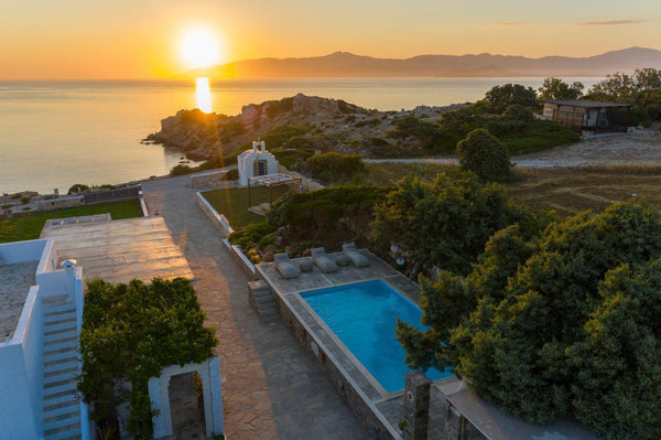 The natural stone, the Cycladic architectural style, the whitewashed interiors &  Agia Thalassa - Beachfront Private Pool Villa Entire villa vacation rental 9895182