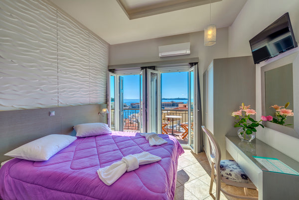 The hotel was built in 2001 and renovated in 2015, is located in the center of H  Exclusive Suite Ermoupolis with majestic sea view. Room in bed and breakfast vacation rental 25118190