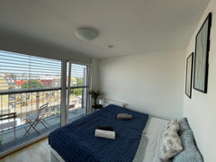 Hello and welcome to Vienna!<br /><br />Lovely room in a large rooftop apartment Vienna, Austria Deluxe Double Room with Balcony Private room in serviced apartment vacation rental 38641581