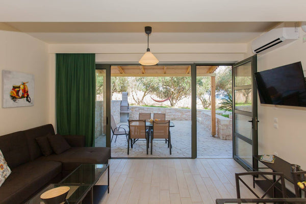 Olive Tree Farm is a complex of 3 apartments and one villa, located in Episkopi  Episkopi, Greece Eva Apartment -Olive Tree Farm 200m from the beach Entire rental unit vacation rental 30736175