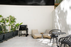 Walk out onto the sunny patio to enjoy a morning cup of coffee. Ignite the BBQ g Athens, Greece Hecate, Studio with a Private BBQ Patio and a Shared Gym Entire rental unit vacation rental 22930406