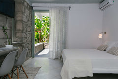 The room is on the ground floor of a 7 apartment building. Its centrally located Greece Alkithea Rooms - Garden View No 6 Room in hotel vacation rental 19873614