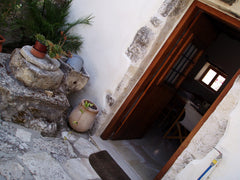 One of the narrow streets of the village, leads us into this building which foll Kounoupidiana, Greece Small traditional house Entire cottage vacation rental 9712690