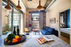 This ground floor apartment of 50m2 welcomes up to four guests to enjoy a wonder Athens, Greece The Foundry Apartment B-0 with a private patio Room in serviced apartment vacation rental 28330265