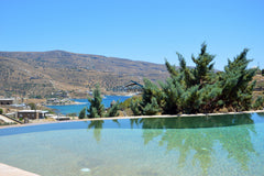 The villa is located in the area of Koundouros and overlooks the the Bay of Koun Athens, Greece Spacious villa with a  pool in the area Koundouros Entire home vacation rental 29424981