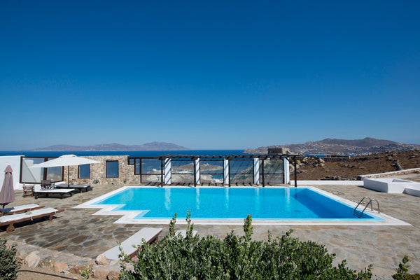 The Villa, 260 sq.m, is built with Mykonian stone and concrete.<br /><br />The V Athens, Greece Villa Amelia with sea view, close to Mykonos town Entire villa vacation rental 48519947