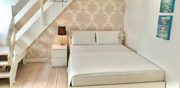 Charming, small Loft apartment, located in the old, prime location of Copenhagen Copenhagen, Denmark Loft in the Center Entire rental unit vacation rental 645405022747277814