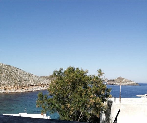Visit Tinos island and breathe the windswept air on this enchanting island. Stay  Panormos magical views two Cycladic home vacation rental 43430146