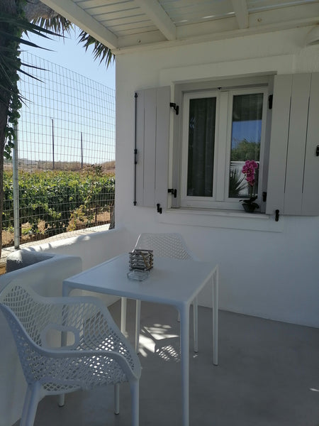 Enjoy a dreamy summer vacation, just 150 meters from the sandy beach of Agioi An Greece Corina Studios & Apartments #6 Entire rental unit vacation rental 51715562