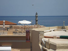 Rooms with air conditioning, fridge, free Wi-Fi and complimentary toiletries. We  Fivos Pension / Studio with Sea View Room in aparthotel vacation rental 13309032