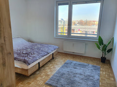 Private bedroom with access to common areas as  a living room area with TV, a ki Vienna, Austria Private Bedroom with a view near the City Center Private room in rental unit vacation rental 40955945