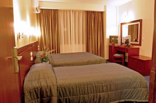Room Size 20 m² <br />1 twin bed  and 1 queen bed  <br />This room features air  GR Triple Hotel Room in the Heart of Athens Room in hotel vacation rental 30421771