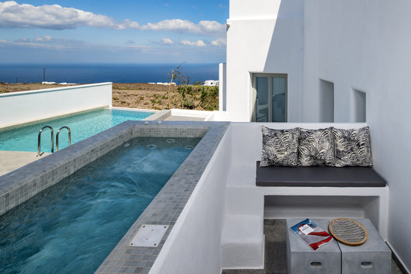 Boasting spectacular views over the Aegean Sea , 