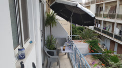 A beautiful neighborhood on a busy street 3 minutes walk from the Temple of Apol Greece APOLLON APARTMENT RHODES H-3 Entire rental unit vacation rental 28017504