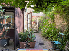 Vores hus er bygget i 1920 og stueetagen blev oprindeligt brugt som autogarage.   Enestående baghus i København Entire townhouse vacation rental 50701887
